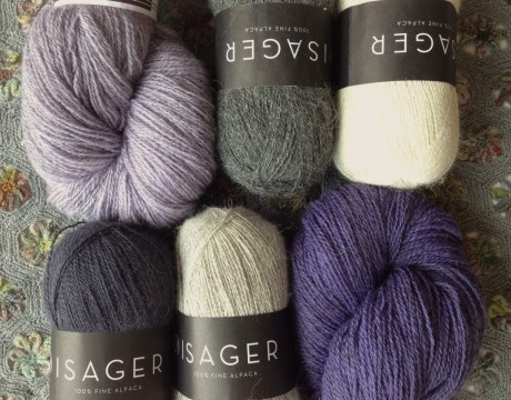 Isager Alpaca 1 CW from top L - 4s Charcoal Grey, 0 Natural White, 2s Light Natural gre, 47 Dark Steel Grey. Tvinni Tweed, Top= 12s Pale lilac with Grey, Bottom = 25s Medium Purple with Grey
