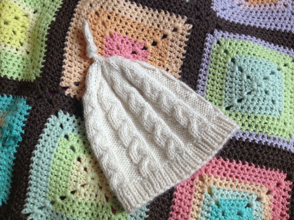 Knotted Cable Hat in Big Bad Wool Weepaca 'Raw White'. Loop, London. www.loopknitlounge.com