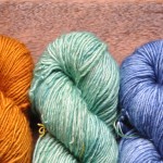 Madelinetosh Merino DK (L-R) Glazed Pecan, Courbets Green, Betty Drapers Blues. Loop, London. www.loopknitlounge.com