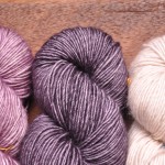 Madelinetosh Merino DK (L-R) Sugar Plum, Composition Book Grey, Antler. Loop, London. www.loopknitlounge.com