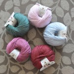DMC Natura 4 Ply Cotton. CW from Top -32 Rose Soraya, 05 Blue Layette, 34 Burgundy,33 Amaranto, 54 Green Smoke. Loop, London. www.loopknitlounge.com