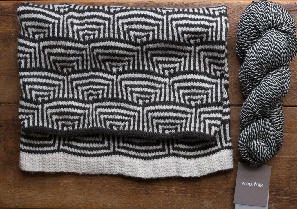  Conic by Lori Versaci in Woolfolk Tynd. Shown with Sno 1+15 Snow & Black. 