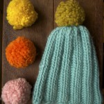 Mrs Moon Plump PomPoms, Lemon Curd, Marmalade and Fondant Fancy with Simple Bobble Hat in Bonbon and 	Gooseberry Fool. Loop, London